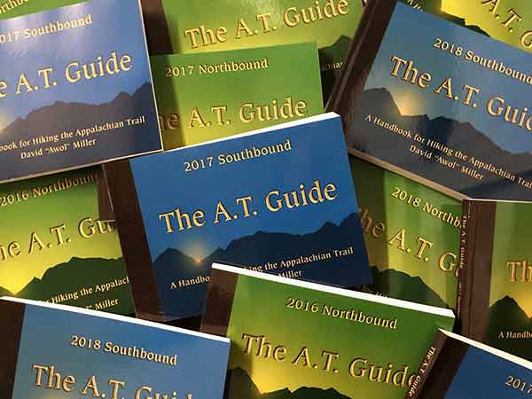 A.T. Guide Legacy Editions in a pile